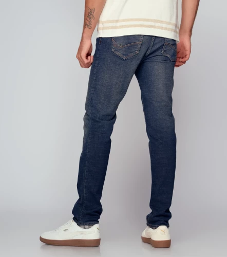 Iron Yhoan Jean Con Procesos Y Rotos Recosidos Azul UnserAZ