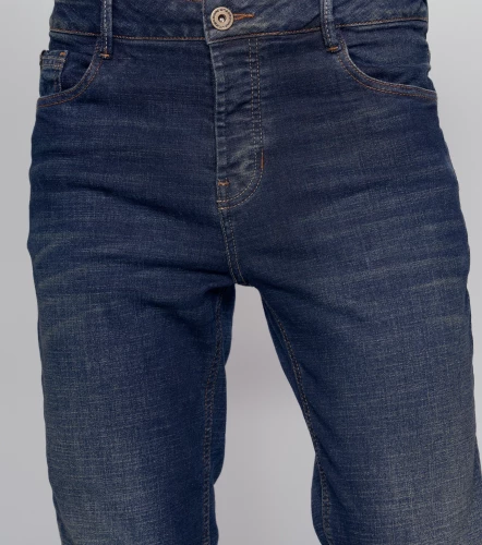 Iron Yhoan Jean Con Procesos Y Rotos Recosidos Azul UnserAZ