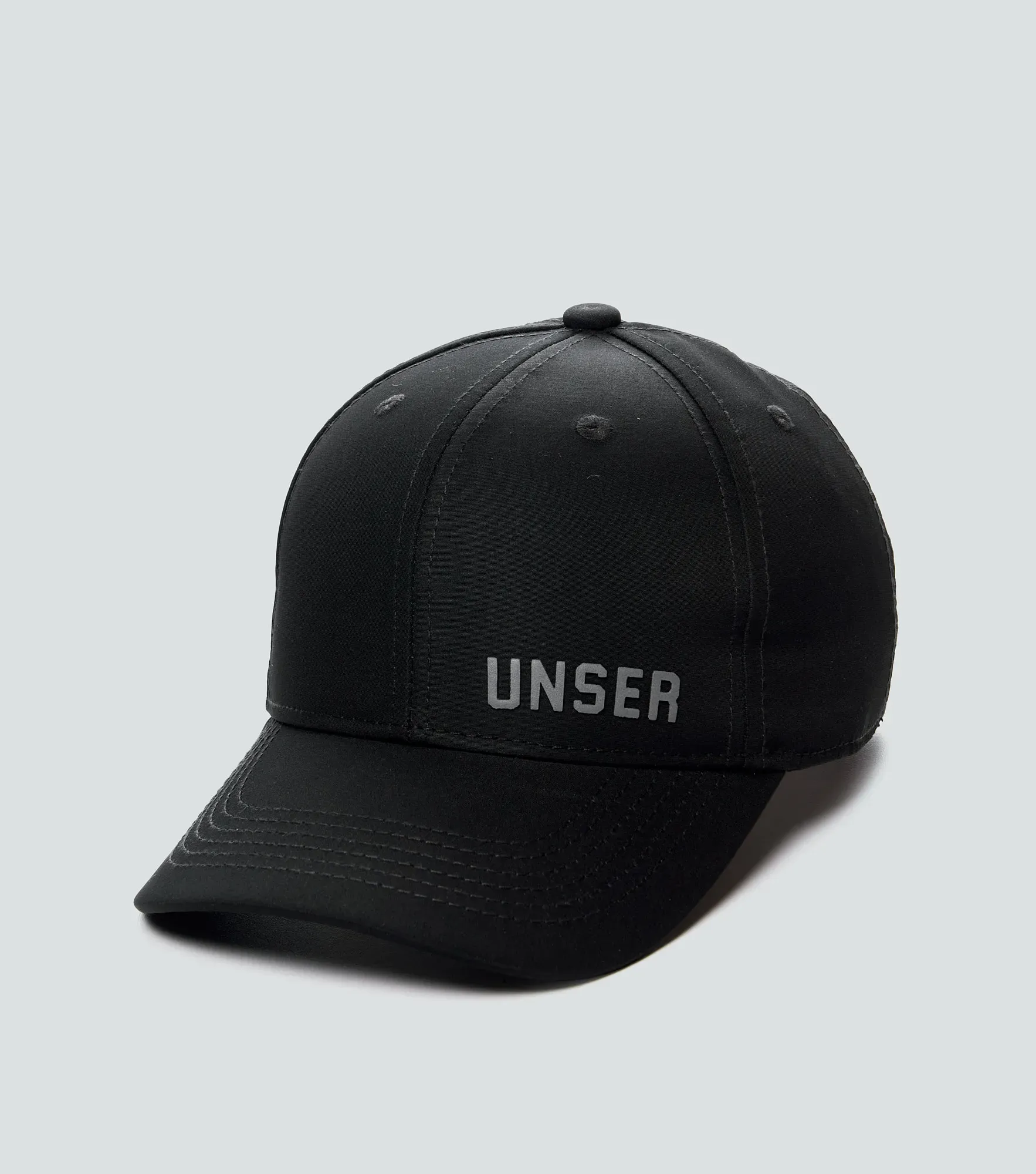 Andy Gorra Unicolor Con Estampado En Delantero UnserNG